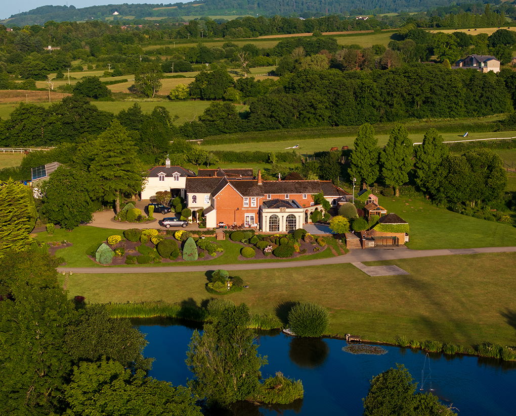 luxury real estate with its own pond and water fountain